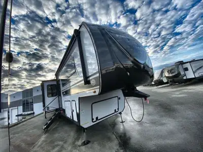 EAST TO WEST Ahara fifth wheel 390DS highlights: Two Full Baths Kitchen Island with Countertop Exten...