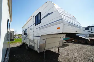 As Is. A low cost 5th wheel camper. This 2004 Terry 24RKS is a 24 foot rear kitchen couples 5th whee...