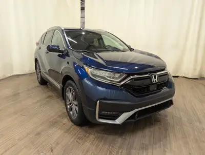 The 2020 Honda CR-V Touring in a captivating blue exterior color offers a remarkable driving experie...