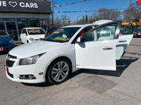..CHEVROLET CRUZE LTZ RS BT PARK ASSIST ALLOYS SUNROOF HEAT LEATHER…..PERFECT. ……….....WE INCLUDE EV... (image 6)