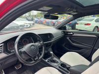 C ome by and check out this eye-catching 2019 Volkswagen Jetta Highline with a bold red exterior and... (image 7)