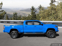 This 2021 Toyota Tacoma Crew Cab Pickup boasts a powerful four-wheel-drive system, perfect for tackl... (image 6)