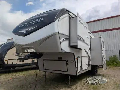 Keystone Cougar Half-Ton fifth wheel 29MBS highlights: Private Bunkhouse Two Power Awnings Rear Kitc...