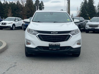 This 2021 Chevrolet Equinox LT has a White exterior and Black seats with seating for 5. Equipped wit... (image 9)