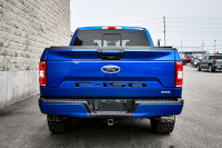This 2018 Ford F-150 is for sale today. This Crew Cab 4X4 pickup has 84,154 kms. It's blue in colour... (image 4)