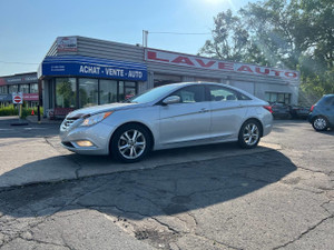 2012 Hyundai Sonata Limited**TOIT OUVRANT PANORAMIQUE**SIEGE EN CUIR**SIEGES CHAUFFANTS**SIEGES CHAUFFANTS ARRIER**MAGS** Financement 1ere, 2e et 3e