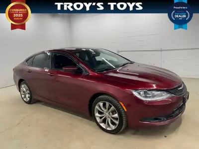 Looking for a stylish and sporty sedan that turns heads? Feast your eyes on this vibrant red 2015 Ch...