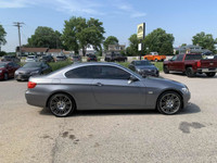 Looking for a thrilling driving experience? Feast your eyes on this sleek 2011 BMW 3 Series 335i xDr... (image 5)