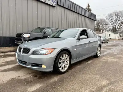 Discover the 2006 BMW 328i Coupe, a luxury vehicle that offers a perfect blend of performance, style...