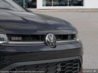 Underneath the sleek Black exterior of this 2025 Volkswagen Jetta GLI Autobahn lies a vibrant Red in... (image 7)