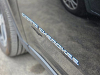 This 2022 Jeep Grand Cherokee 4xe, presented in a menacing and sophisticated *Black* finish, represe... (image 9)