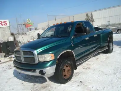 NORTH POINT MOTORS...CALL TEXT 780-224-7791 CHECK OUT THIS 03 DODGE RAM 3500 QUAD CAB 4X4 DRW 5.9L C...