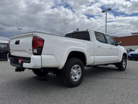 This 2022 Toyota Tacoma Crew Cab Pickup boasts a powerful four-wheel-drive system, perfect for tackl... (image 6)
