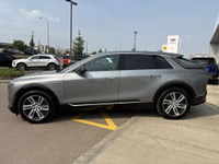 The 2024 Cadillac LYRIQ Tech in Argent Silver Metallic is a sophisticated all-electric SUV built on... (image 4)