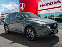 Experience the confident handling and smooth ride of this 2024 Mazda CX-5 GS, boasting only 6904 kil... (image 7)