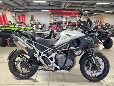 Experience the pinnacle of motorcycle engineering with the 2024 Triumph Tiger 1200 GT Pro. Designed...