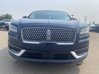 Under the glistening Rhapsody Blue exterior, the 2019 Lincoln Nautilus Reserve stands as a testament... (image 1)