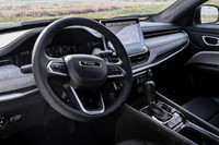 This Jeep Compass has a dependable Intercooled Turbo Regular Unleaded I-4 2.0 L/122 engine powering... (image 9)