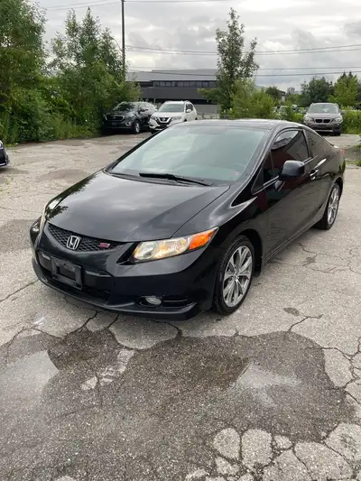 very clean loaded 2dr SI coupe 6 speed manual sunroof navigation alloys ac and fully certified inclu...
