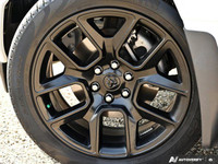 This 2023 Ram 1500 Sport Crew Cab 4x4 boasts a commanding presence with its Bright White exterior an... (image 5)