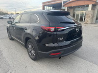 Elevate your drive with the 2023 Mazda CX-9 GS, a three-row SUV that combines luxury, performance, a... (image 2)