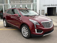 The 2017 Cadillac XT5 Platinum in Red Passion Tintcoat delivers all-wheel drive performance powered... (image 9)