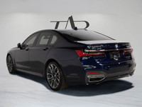 This sophisticated 2020 BMW 750i blends flagship luxury with commanding performance, finished in a d... (image 4)