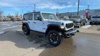 This 2024 JEEP WRANGLER 4-DOOR RUBICON 4XE has the following options Sustainable Premium Cloth Seats... (image 1)
