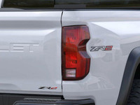 The 2025 Chevrolet Colorado ZR2, presented in Summit White with a Jet Black/Artemis interior, is eng... (image 2)