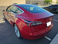This stunning TESLA MODEL 3 with RED MULTI-COAT and black interior is complimented with upgraded ALL... (image 2)