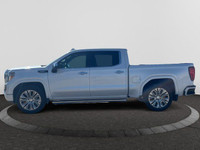 The All New GMC Sierra has been redefined from Hood to Hitch. This 4WD White Sierra is a Crew Cab Pi... (image 1)