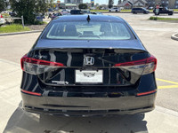 The 2022 Honda Civic EX Sedan is powered by a 1.5L turbocharged 4-cylinder engine paired with a CVT,... (image 4)