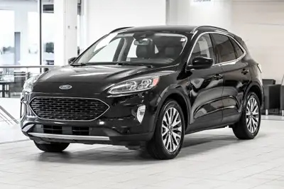 Superbe Escape offert en version Titanium incluant la motorisation 2.5L hybride, la traction intégra...