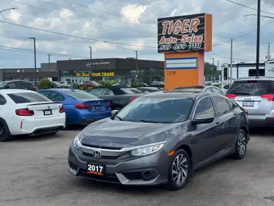 TIGER AUTO SALES LTD - Quality Pre-Owned Car Dealership - Located at 2275 Dundas St., London, Ontari...