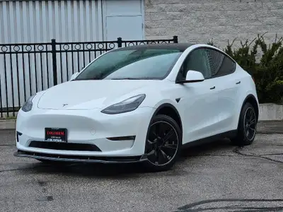 This stunning TESLA MODEL Y WITH UPGRADED LUXURIOUS Pearl White Exterior paint option with the stunn...
