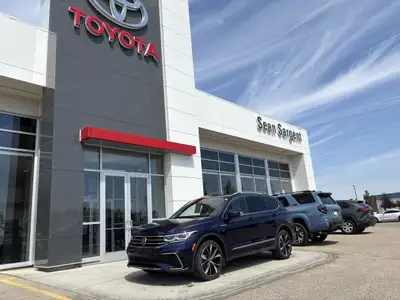 Experience refined driving with the 2024 Volkswagen Tiguan SE R-Line Black, now available at Sean Sa...