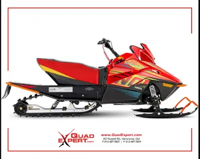 The Snoscoot is an easy-to-ride electric-start, four-stroke, 200cc-class snowmobile for younger, sma...