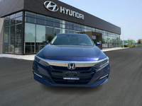 The 2018 Honda Accord Hybrid Touring is a midsize sedan that seamlessly blends efficiency, performan... (image 1)