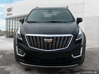 The 2023 Cadillac XT5 includes a hands-free liftgate, panoramic roof, heated front seats, and leathe... (image 7)