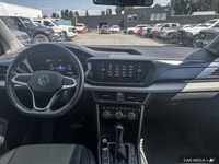 This Volkswagen Taos boasts a Intercooled Turbo Regular Unleaded I-4 1.5 L/91 engine powering this A... (image 9)