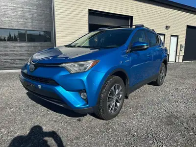 The 2017 Toyota RAV4 Hybrid XLE in a stunning blue finish offers exceptional control with its AWD dr...