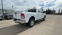 This Ram 2500 is equipped with: Cloth Front 40/20/40 Bench Seat, Radio: Uconnect 5 Nav w/8.4 Display... (image 7)