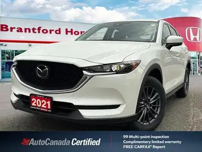 Experience the smooth handling and confident all-wheel drive of this 2021 Mazda CX-5 CX5TRXA. With o...