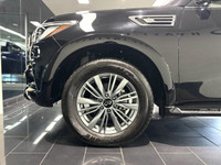The 2024 Infiniti QX80 Luxe is a powerful and refined SUV, driven by a 5.6L premium engine that deli... (image 4)
