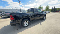 This 2025 RAM 1500 TRADESMAN QUAD CAB 4X4 has the following options Cloth Bench Seat, Remote Start S... (image 1)