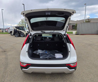 Step into the future of efficient driving with the 2025 Kia Niro Plug-In Hybrid LXa sleek crossover... (image 5)