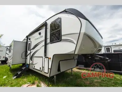 Keystone Cougar Half-Ton fifth wheel 27SGS highlights: Two Recliners Sleeper Sofa Peninsula Countert...