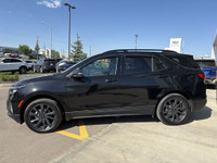 The 2022 Chevrolet Equinox RS brings a bold and athletic look with its Mosaic Black Metallic paint,... (image 4)
