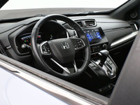 The 2020 Honda CR-V Sport is a well-rounded compact SUV offering a turbocharged 1.5L engine, smooth... (image 5)