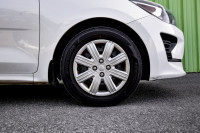 This 2021 Kia Rio 5-door is for sale today. This hatchback has 93,927 kms. It's white in colour . It... (image 7)